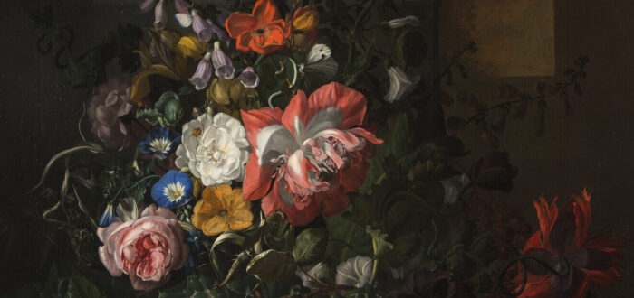 An elaborate floral arrangement painted with precise detail appears dramatically spot lit against a dark background. Large red and pink blooms dominate, interspersed with small yellow, white, and blue blossoms and varied foliage. Moths and other insects a