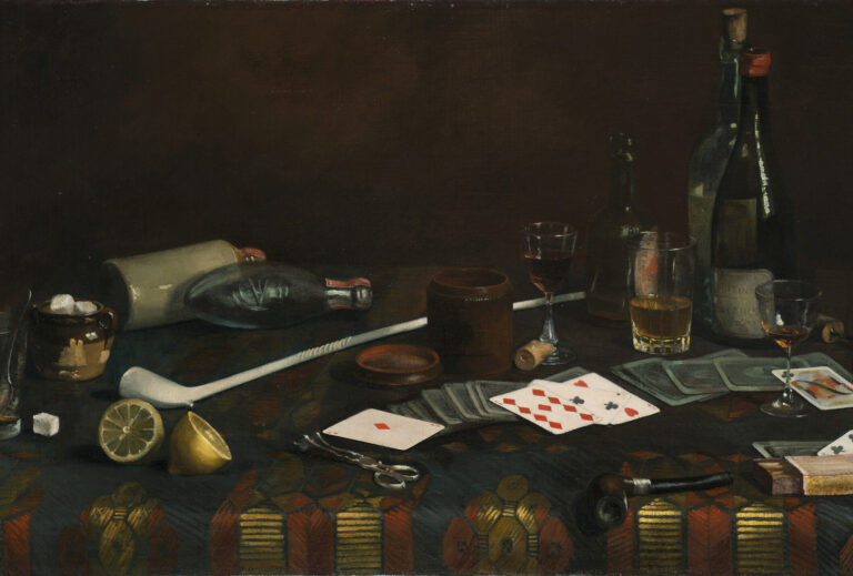 Painting of a blue tablecloth with gold and red pattern. Strewn across the top are half-empty glasses of wine and brown liquid, playing cards, lemon halves and matches. Two pipes, one long and white, one small and dark, lie next to a container of sugar cubes, corks, and bottles.