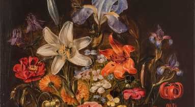 Realistic and detailed, the still life painting meticulously renders a variety of brightly colored flowers densely arranged in a dark round vase set against a dark background. The vase sits upon a stone ledge with two stray pink roses laying in the foreground.