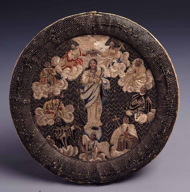 Unknown artist, Nun’s Emblem, 18th century; Silk and silver thread embroidery, 7 in. diameter; Franz Mayer Collection