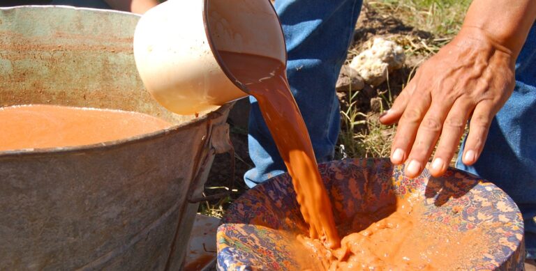 Preparing clay in Mata Ortiz (2011) by Jami Porter Lara