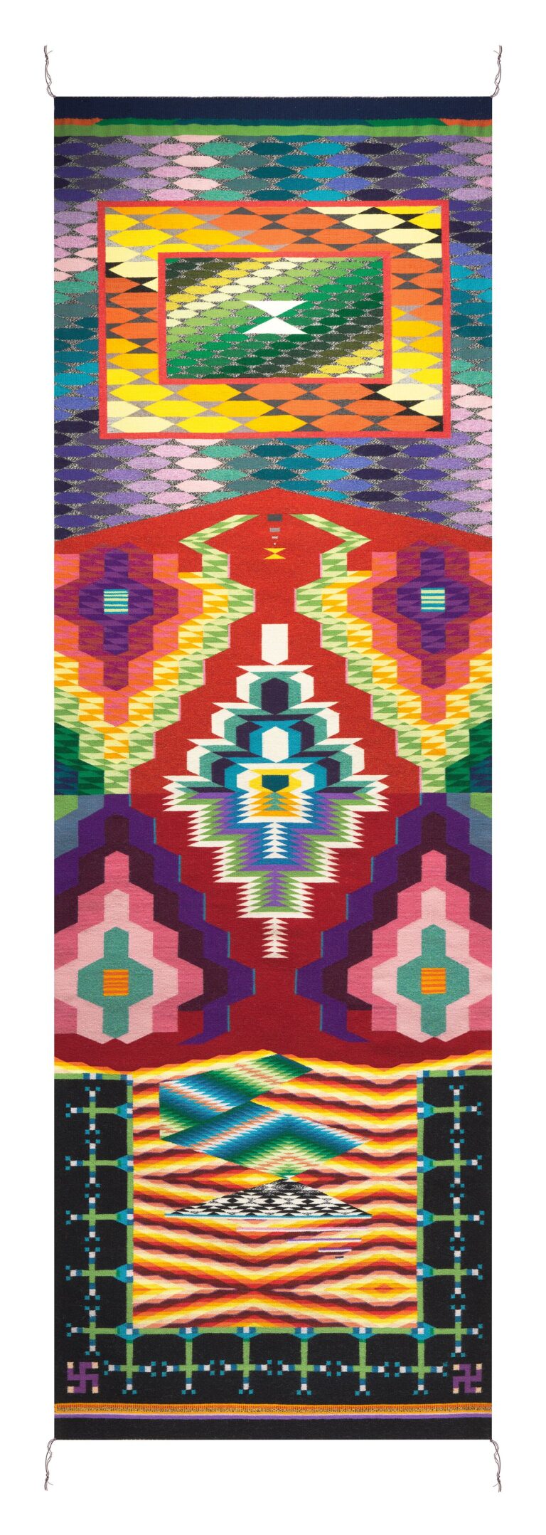 An image of a woven textile artwork. Colorful geometric shapes combine with lines to form intersecting geometric patterns, creating a pixelated effect.